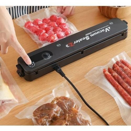 Machine à emballer sous vide